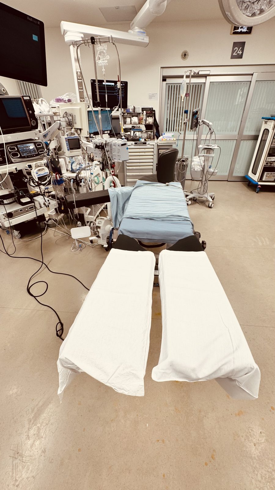STERIS Amsco Split Leg Positioner (BF35-100, PN 2-1335-006) — attaches to the OR table for anterior lumbar / lumbar TDR positioning (facility setup)