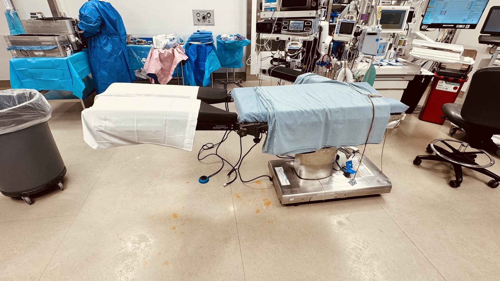 STERIS Amsco Split Leg Positioner (BF35-100, PN 2-1335-006) — attaches to the OR table for anterior lumbar / lumbar TDR positioning