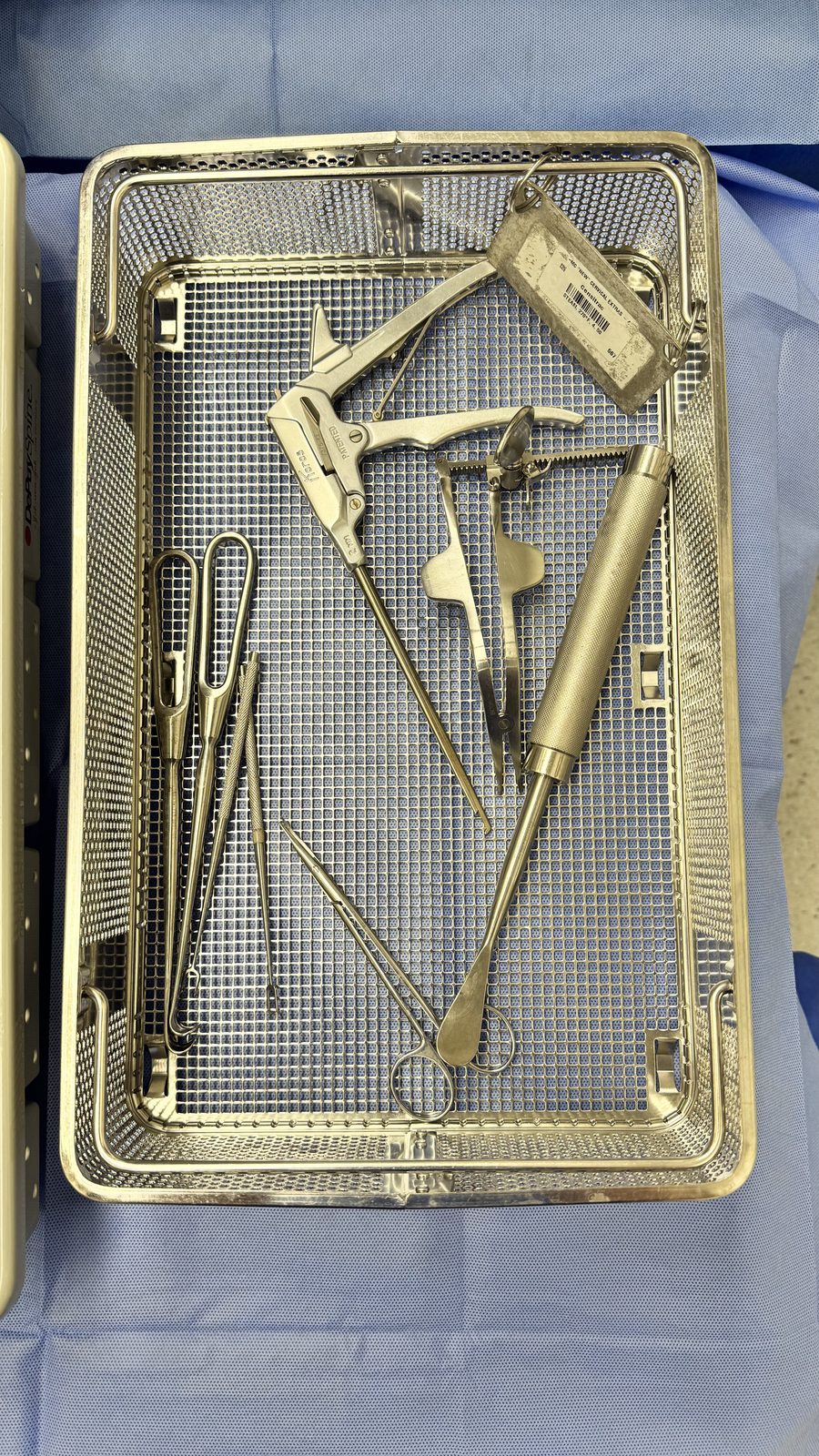 Cervical Extras — assembled tray (Koros rotating 2 mm Kerrison, Cloward lamina spreader, Cushing vein retractors, Cobb elevators, Stevens tenotomy scissors)